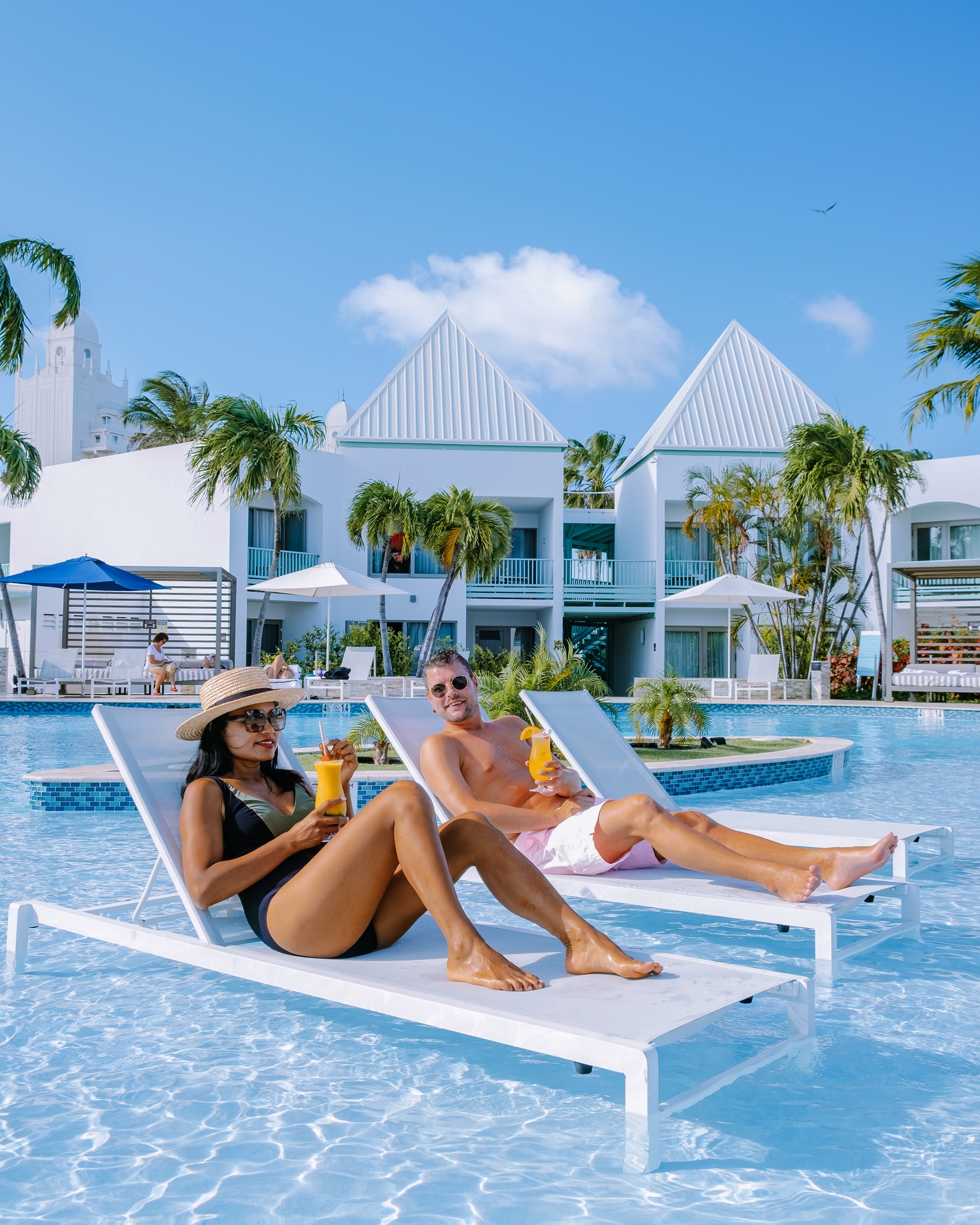 couple man and woman mid age on a luxury vacation in the Caribbean Aruba